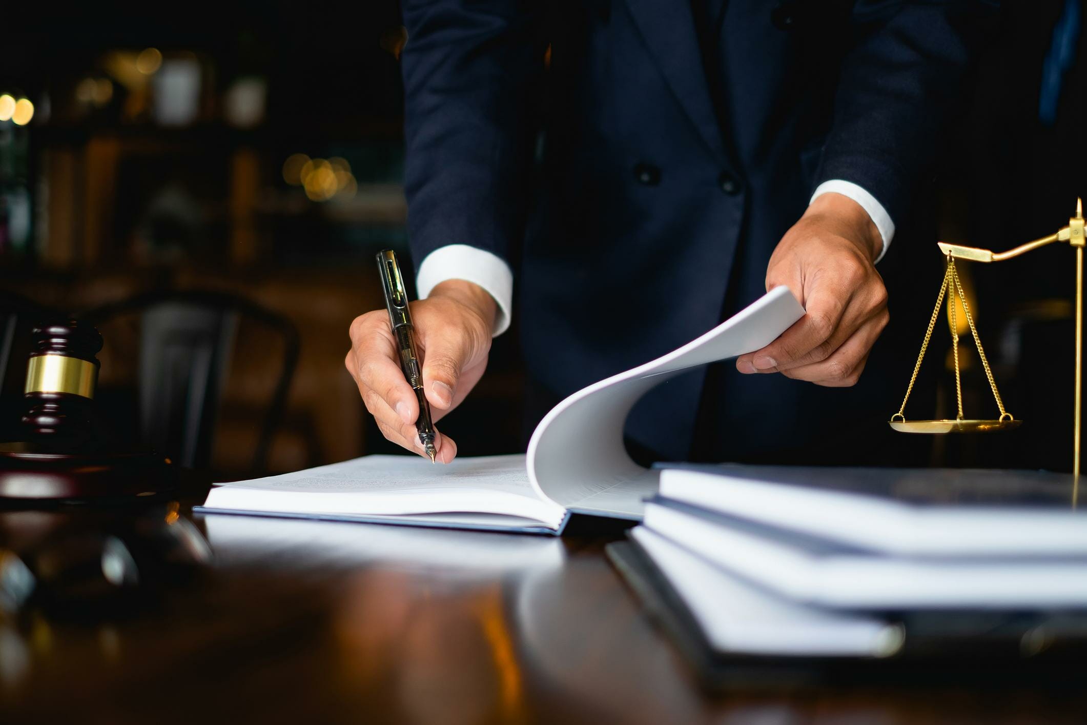 Federal litigation as plaintiff. Attorney work with gavel and scales of justice.