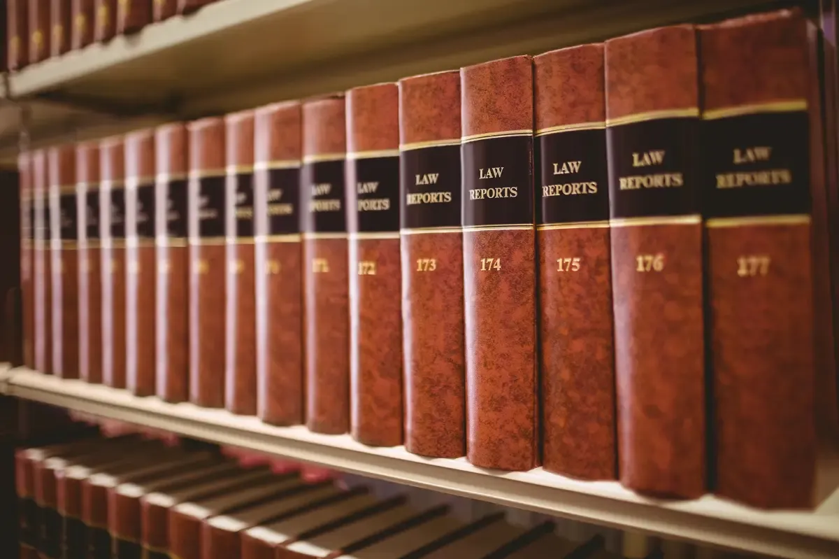 Shelf of bound Law Reports volumes in a legal library, on Andrew Hillman's record