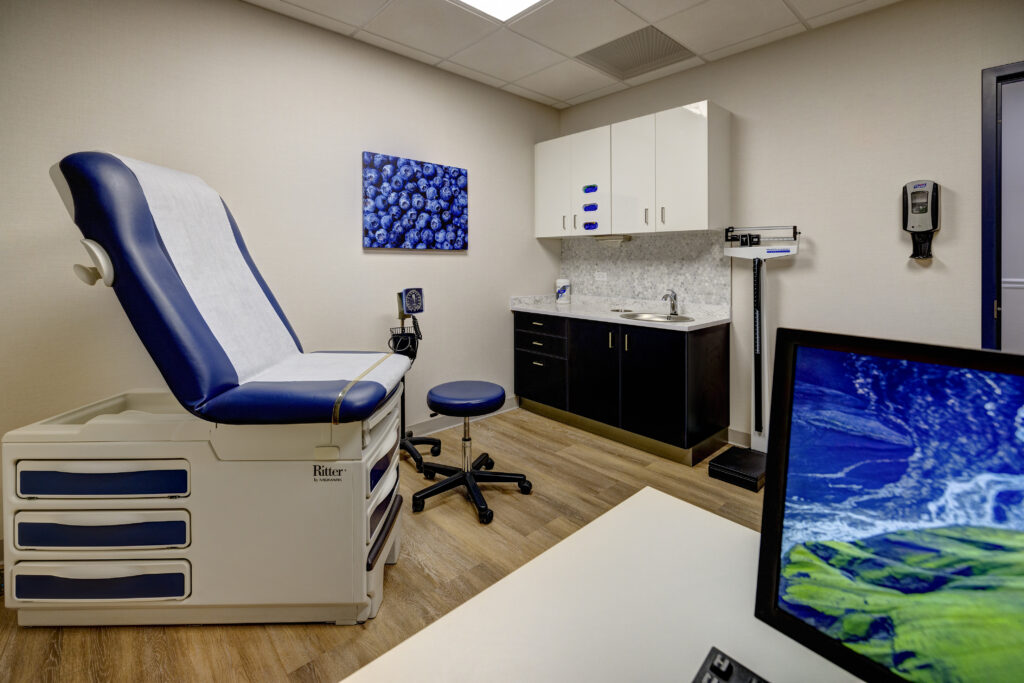 Northbrook Medical Center clinical exam room with blue exam table