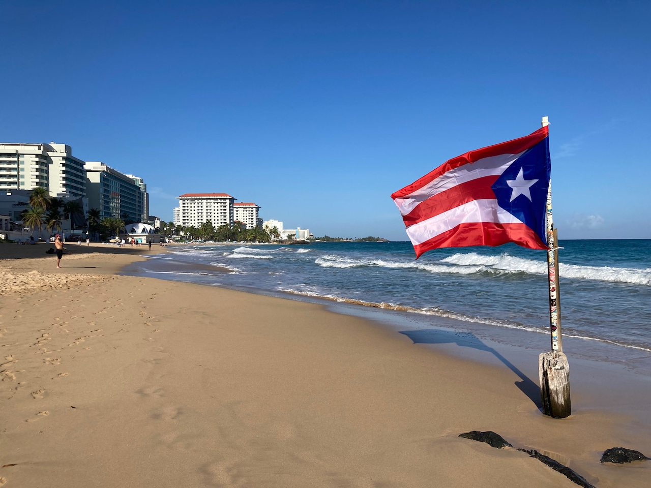 Puerto Rico beach with Puerto Rican flag